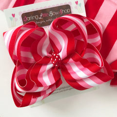 Valentine hairbow, red and pink striped hairbow, double stacked bow with polka dot center