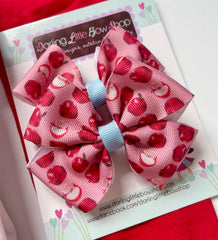Apple print pigtail bows