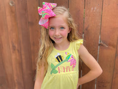 Yellow flutter sleeve dress with lilly print bumblebee flower