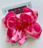 Satin double stacked bow for Valentines Day with sequin heart center - Darling Little Bow Shop