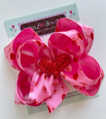 Satin double stacked bow for Valentines Day with sequin heart center