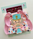 Nutcracker hairbow with pink and aqua ribbons - Darling Little Bow Shop